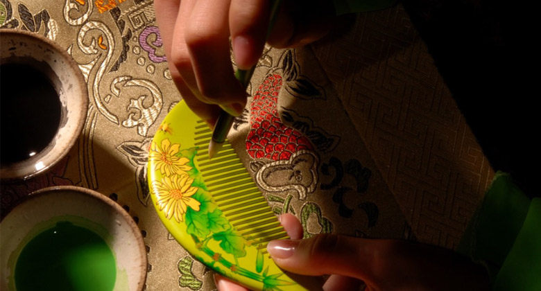 谭木匠LOGO，谭木匠标志，谭木匠品牌设计，木梳品牌设计